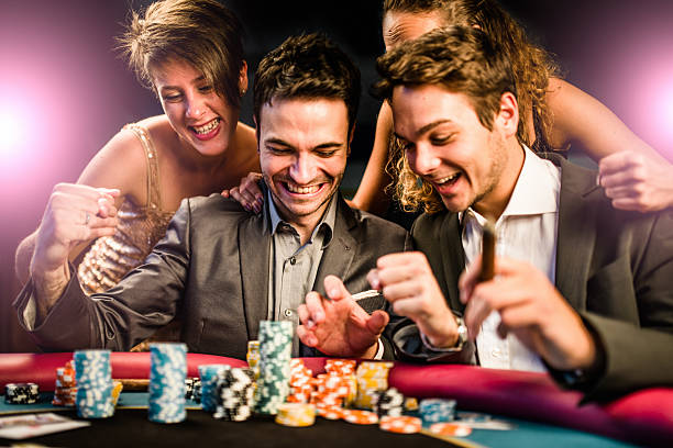 Live casino studio with multiple dealer positions and player terminals